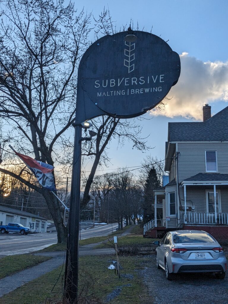 subversive brewing entrance sign.