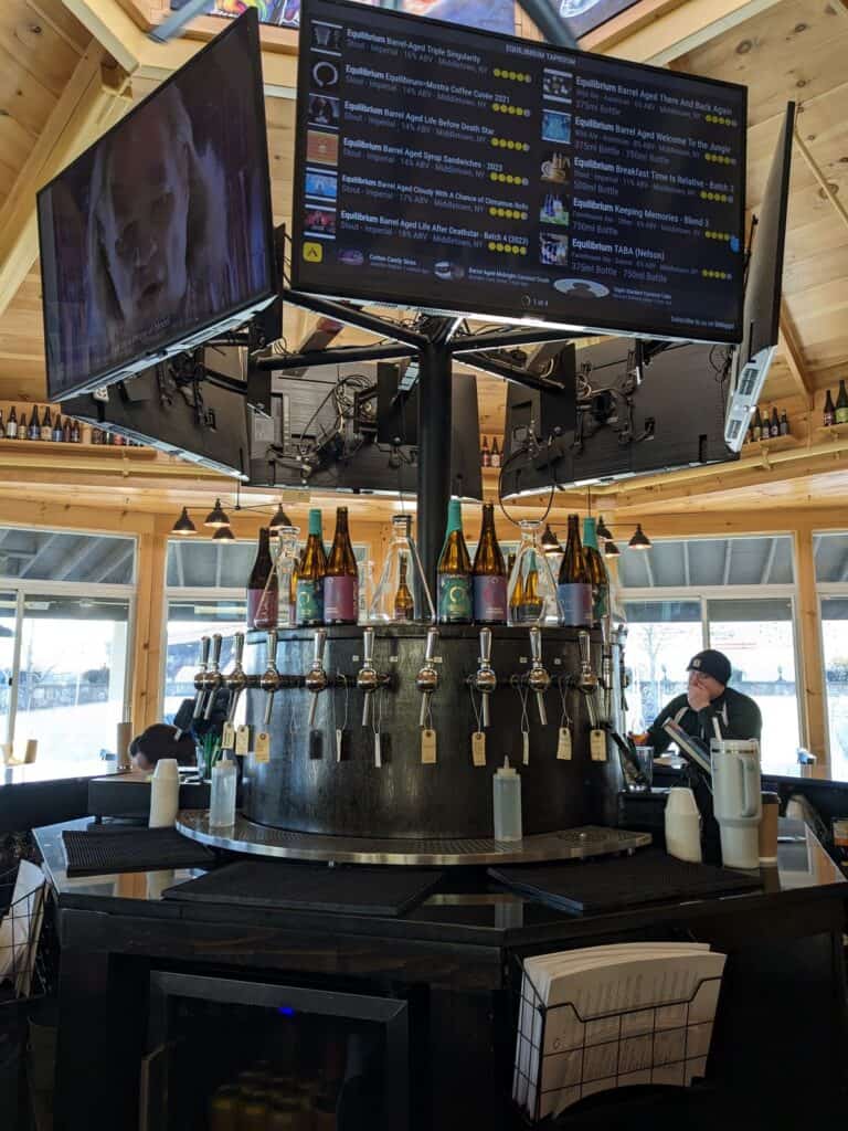 Electronic tap list above the bar.