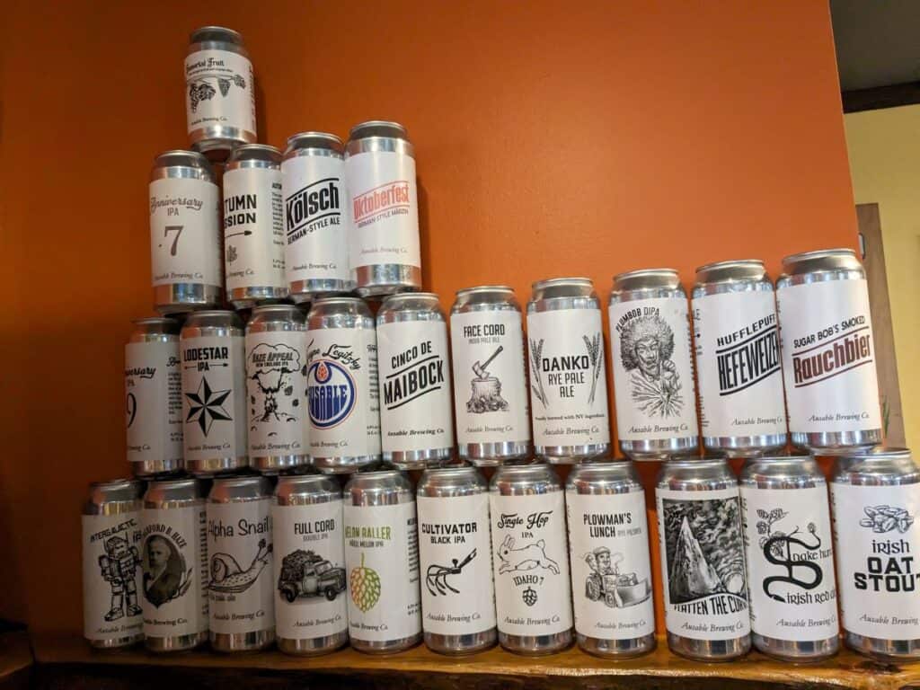 Wall of Ausable empty beer cans.