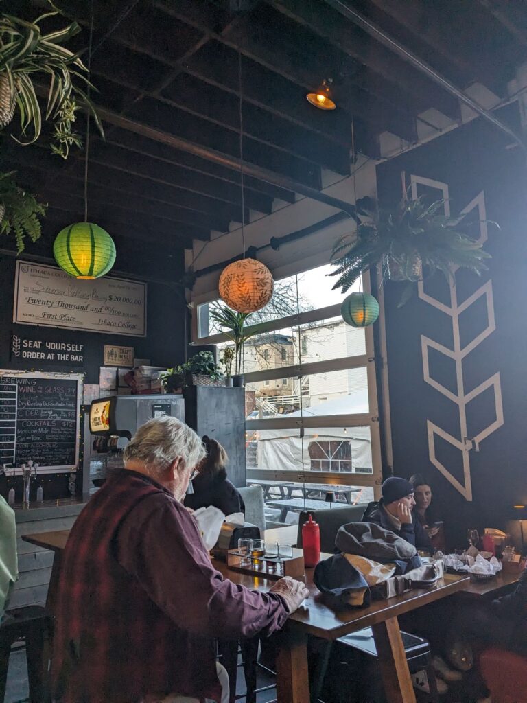 Some of the tap room seating, high tables and booths.