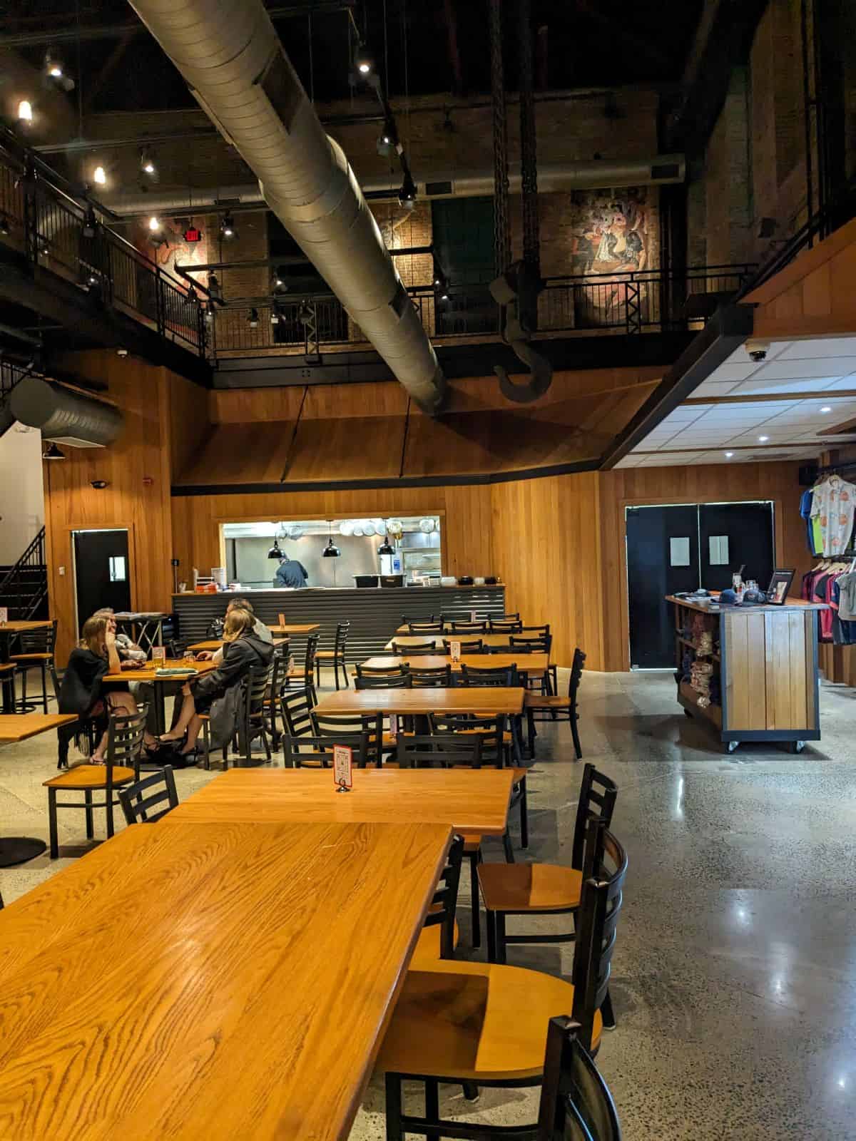 Seating area with a view of the kitchen and merch area.