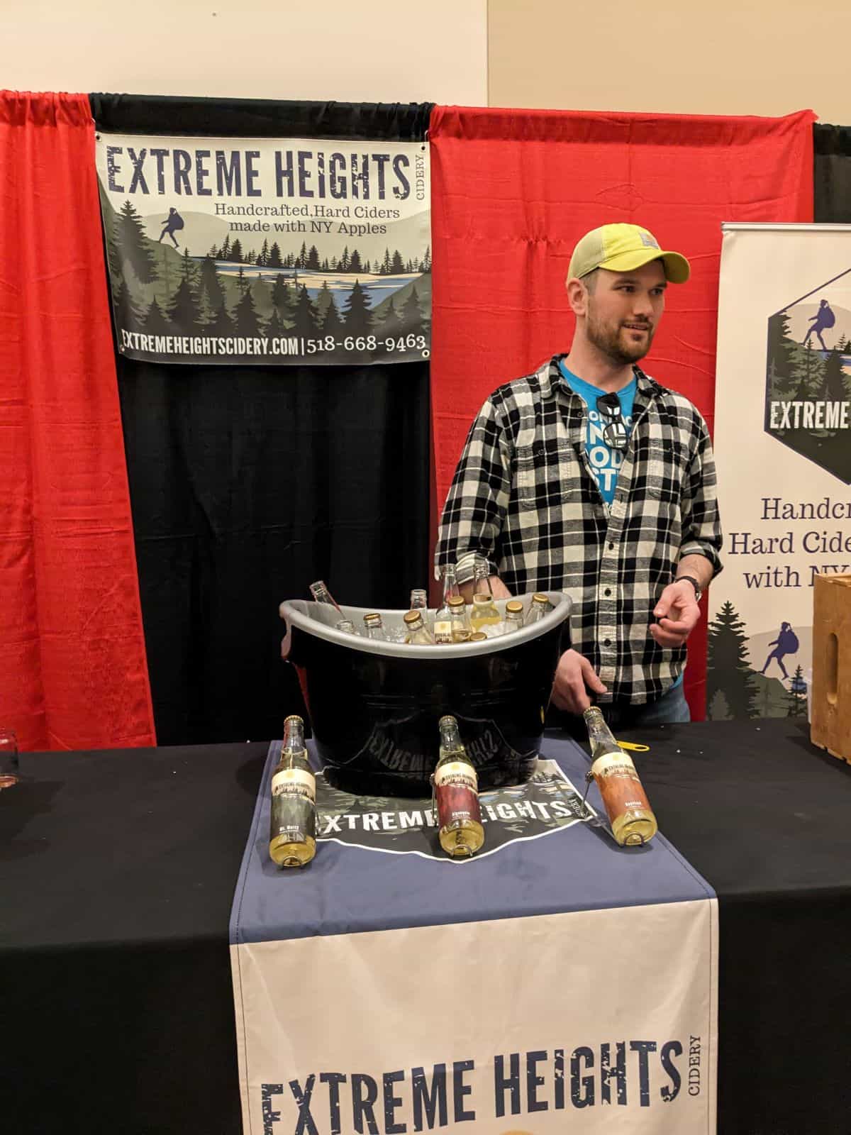 Extreme Height Cidery table with 3 flavors of offered cider.