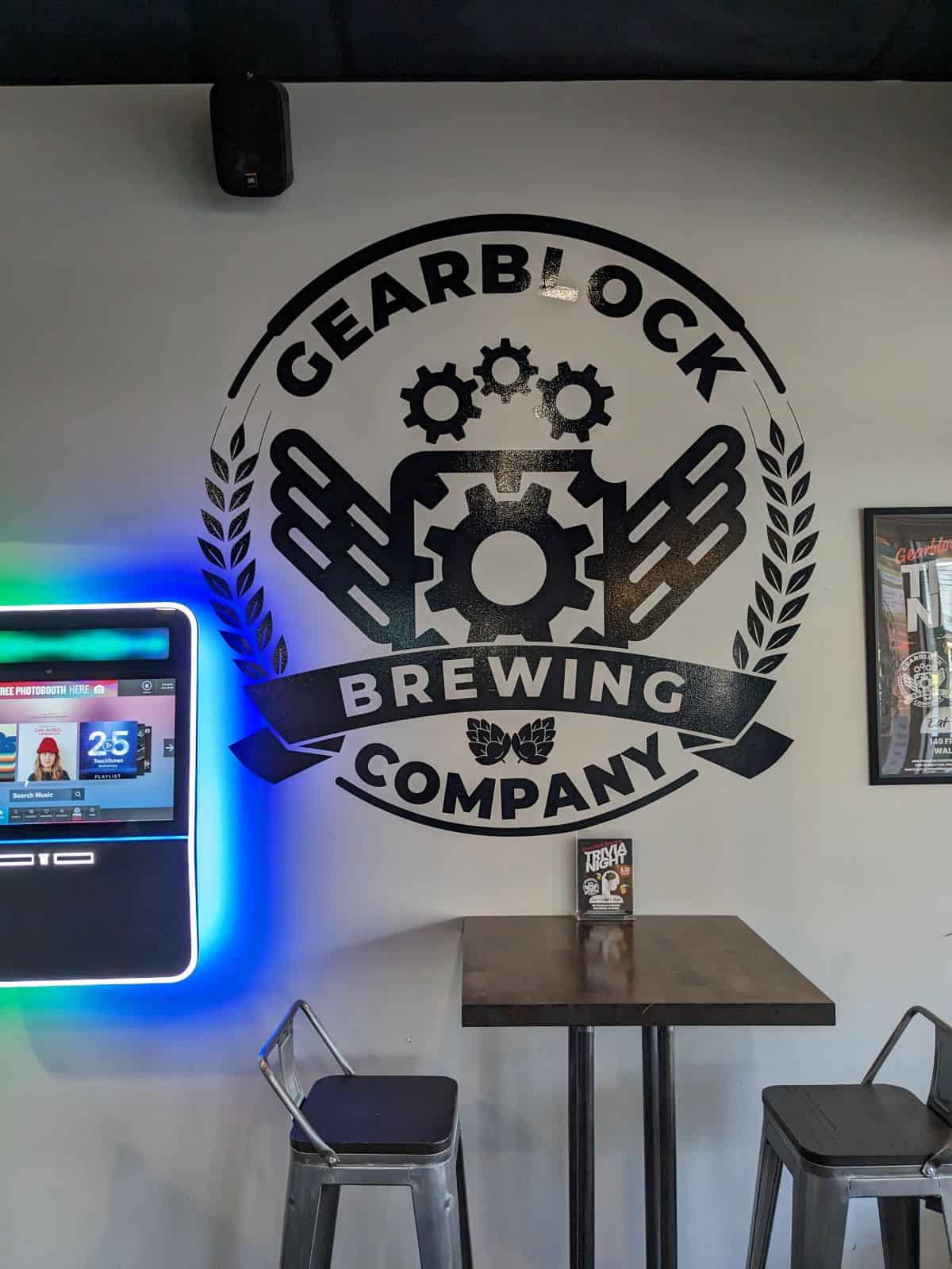 Gearblock Brewing Company logo on wall.