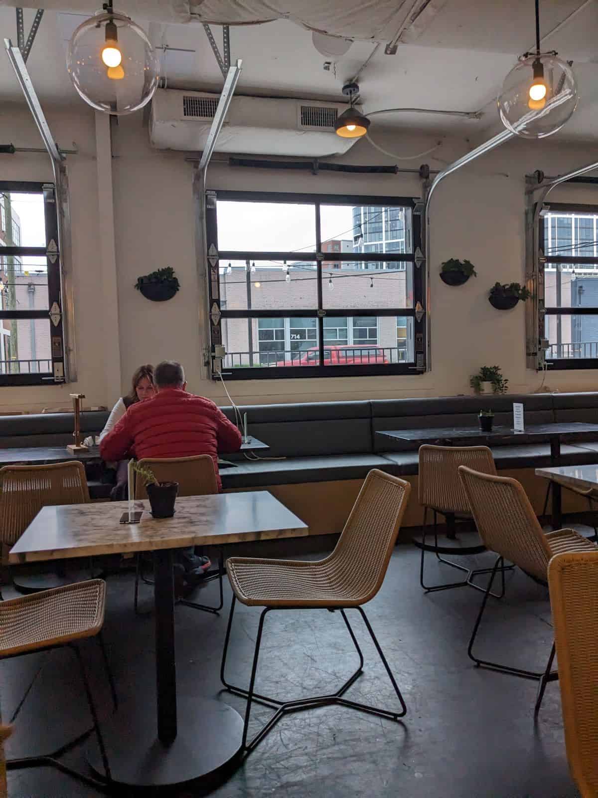 Garage door style windows in the taproom.