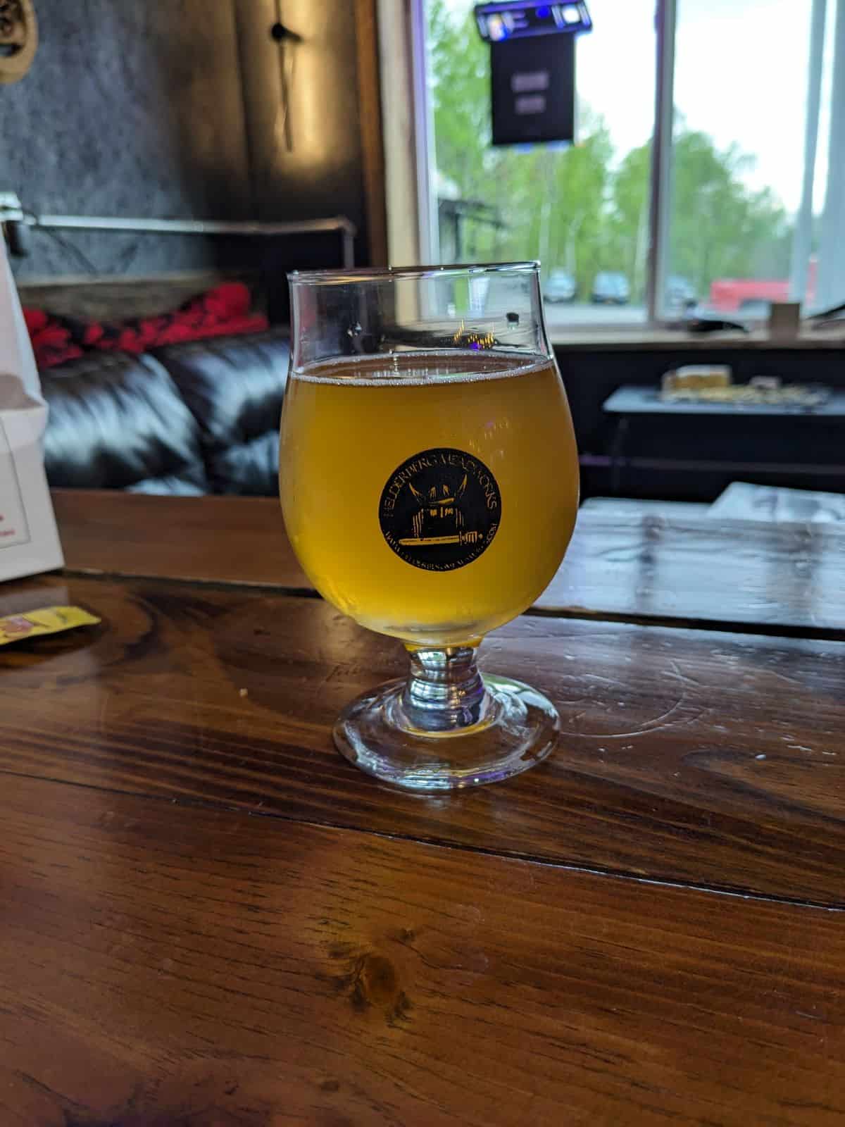 Glass of mead on a table.