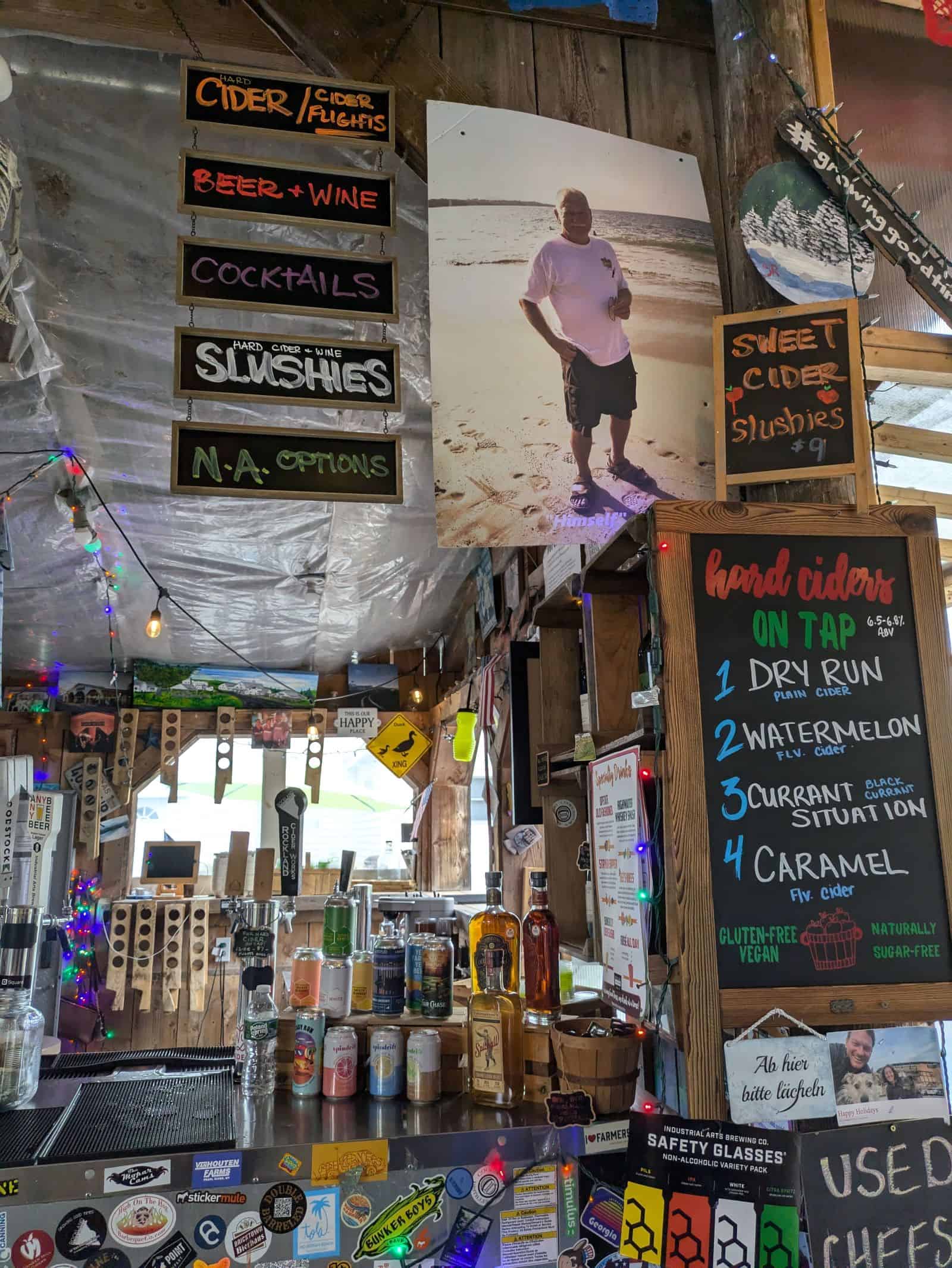 Drink offering signs at a bar.