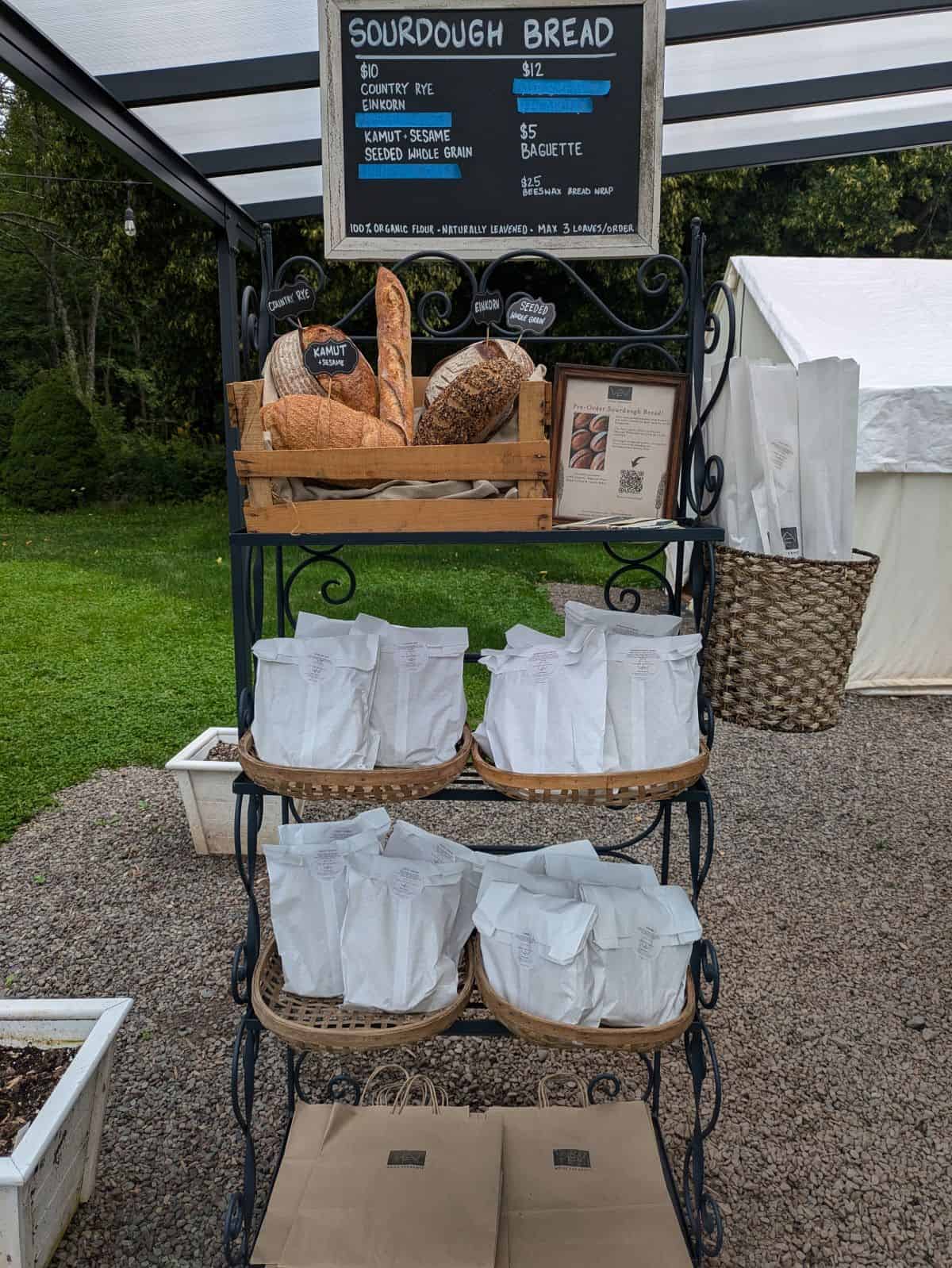 Bread for sale station and sign.