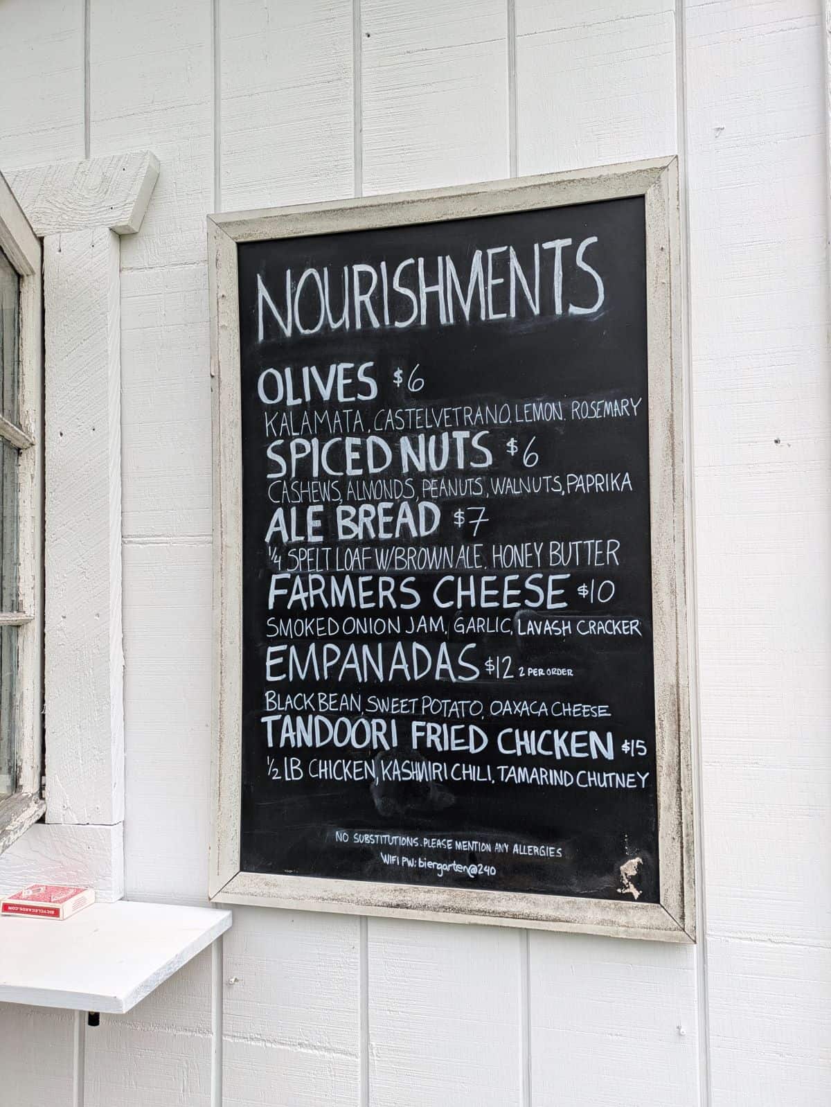 Food menu on a chalkboard.