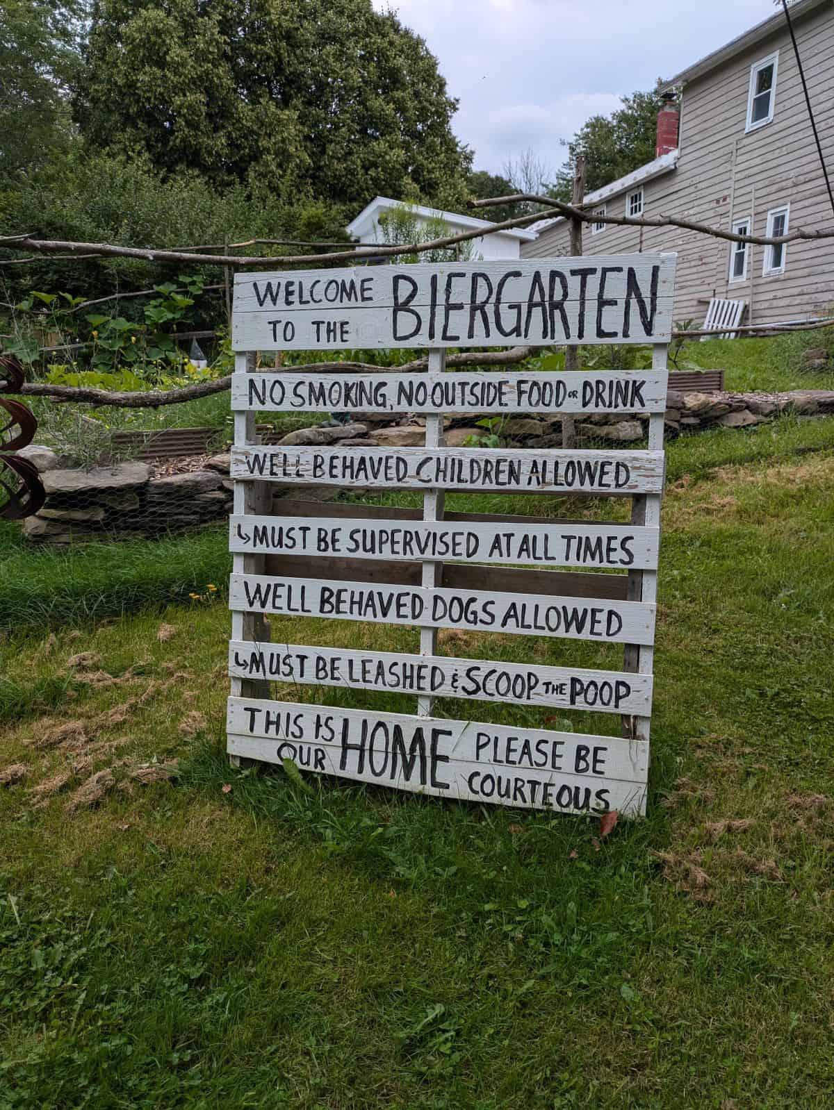 Weiss Ferments Biergarten welcome sign with rules.